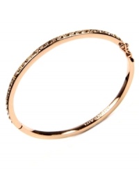 Polished and sleek. Givenchy's rose gold tone bangle bracelet features silk glass stones. Approximate diameter: 2-1/2 inches. Polished and sleek. Givenchy's rose gold tone bangle bracelet features silk glass stones. Approximate diameter: 2-1/2 inches.