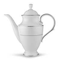 With enameled pearl-like dots, an opalescent background, and the innocence of bone china, Opal Innocence is a romantic pattern of understated elegance. Two bands of platinum a slightly wider one on the rim, kissing a thin fluted design, and a narrower one inside the border adorn each plate. The cup bears additional platinum on its graceful handle and another band at midpoint. Each piece is decorated with a flowing, white-on-white vine design peppered with enamel dots. This service creates a splendid formal table setting and, because of its neutral coloring, works well with any table décor. With enameled pearl-like dots, an opalescent background, and the innocence of bone china, Opal Innocence is a romantic pattern of understated elegance. Two bands of platinum a slightly wider one on the rim, kissing a thin fluted design, and a narrower one inside the border adorn each plate. The cup bears additional platinum on its graceful handle and another band at midpoint. Each piece is decorated with a flowing, white-on-white vine design peppered with enamel dots. This service creates a splendid formal table setting and, because of its neutral coloring, works well with any table décor.