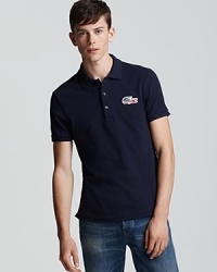 Express your enthusiasm for the U.S. team with this slim-fitting Lacoste polo. Long after the Olympics are over, the oversized patriotic croc will remain in style. Express your enthusiasm for the U.S. team with this slim-fitting Lacoste polo. Long after the Olympics are over, the oversized patriotic croc will remain in style.