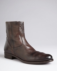 Crafted entirely from supple leather and furnished with an easy side zip entry, this boot refortifies your closet of essential shoes. Crafted entirely from supple leather and furnished with an easy side zip entry, this boot refortifies your closet of essential shoes.
