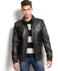 Come out ahead wearing this rugged and classic faux leather moto styled jacket by Guess Jeans. Come out ahead wearing this rugged and classic faux leather moto styled jacket by Guess Jeans.