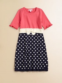 Polka dots and a charming bow breathe new life into this charming knit frock.ScoopneckShort sleeves with ruffled cuffsPullover styleWaistband with bow detailCottonMachine washImported Polka dots and a charming bow breathe new life into this charming knit frock.ScoopneckShort sleeves with ruffled cuffsPullover styleWaistband with bow detailCottonMachine washImported