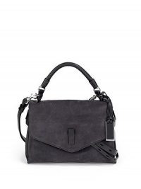 THE LOOKCalfskin body with cowhide trimRolled leather top handleRemovable, adjustable crossbody strap with shoulder padLogo ID tagFlap with concealed push-lock closureFront loop detailWrap-around belt under the flapExpandable side zip gussetsLeather-covered protective metal feetOne inside zip pocketOne inside open pocketInside logo detailTHE MEASUREMENTTop handle, 4 dropAdjustable crossbody strap THE LOOKCalfskin body with cowhide trimRolled leather top handleRemovable, adjustable crossbody strap with shoulder padLogo ID tagFlap with concealed push-lock closureFront loop detailWrap-around belt under the flapExpandable side zip gussetsLeather-covered protective metal feetOne inside zip pocketOne inside open pocketInside logo detailTHE MEASUREMENTTop handle, 4 dropAdjustable crossbody strap