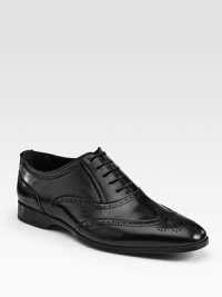 A handsome dress standard is accented with perforated and lace-up details. here.Leather upperLeather liningRubber soleMade in Italy A handsome dress standard is accented with perforated and lace-up details. here.Leather upperLeather liningRubber soleMade in Italy
