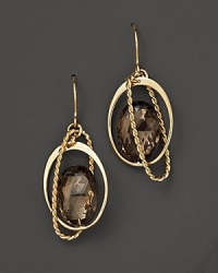 Oval freeform smoky quartz briolettes add rich sparkle to links of 14K yellow gold. By Nancy B. Oval freeform smoky quartz briolettes add rich sparkle to links of 14K yellow gold. By Nancy B.