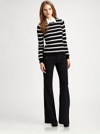 The form-fitting pant that launched the renowned fit-conscious brand, this Alice + Olivia original boasts a signature wide waistband, streamlined welt pockets and slightly flared, leg-lengthening hem.Tab-front waistBelt loopsZip-flyFront slash pocketsBack welt pocketsRise, about 9Inseam, about 3498% wool/2% LycraDry cleanMade in USAModel shown is 5'8½ (174cm) wearing US size 4. The form-fitting pant that launched the renowned fit-conscious brand, this Alice + Olivia original boasts a signature wide waistband, streamlined welt pockets and slightly flared, leg-lengthening hem.Tab-front waistBelt loopsZip-flyFront slash pocketsBack welt pocketsRise, about 9Inseam, about 3498% wool/2% LycraDry cleanMade in USAModel shown is 5'8½ (174cm) wearing US size 4.