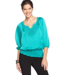 Crochet trim at the neck of Alfani's petite top freshens the look for spring, while a smocked hemline creates a flattering blouson-style silhouette. (Clearance) Crochet trim at the neck of Alfani's petite top freshens the look for spring, while a smocked hemline creates a flattering blouson-style silhouette. (Clearance)