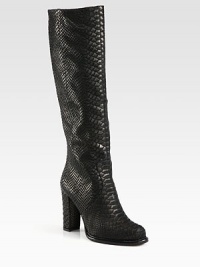 Reptile-embossed Italian leather adds textural appeal to this seasonal staple with a powerful heel. Self-covered heel, 3¾ (95mm)Shaft, 15½Leg circumference, 13½Reptile-embossed leather upperSide zipLeather liningRubber solePadded insoleMade in Italy Reptile-embossed Italian leather adds textural appeal to this seasonal staple with a powerful heel. Self-covered heel, 3¾ (95mm)Shaft, 15½Leg circumference, 13½Reptile-embossed leather upperSide zipLeather liningRubber solePadded insoleMade in Italy