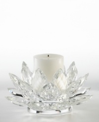 A fanciful crystal Lotus blossom from Lighting by Design brightens with the soft glow of candlelight for truly beautiful, over-the-top shine. Includes pillar candle. A fanciful crystal Lotus blossom from Lighting by Design brightens with the soft glow of candlelight for truly beautiful, over-the-top shine. Includes pillar candle.