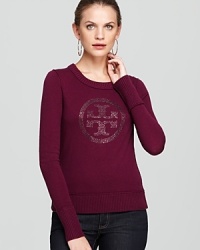 The essential Tory Burch sweater gets a glamorous update as the brand's iconic logo shimmers against a sumptuous wool silhouette. The essential Tory Burch sweater gets a glamorous update as the brand's iconic logo shimmers against a sumptuous wool silhouette.