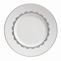 Vera Wang introduces Flirt fine bone china dinnerware. This platinum banded pattern features a modern scallop lace motif and a contemporary take on traditional lace work. Decoration on the inner verge of the accent plate, bread and butter and tea saucer adds a flirtatious touch of whimsy.