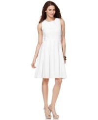 Jones New York's dress is done with a classic A-line silhouette and a lace-like floral pattern throughout. Try wearing with colorful heels and accessories to personalize your style! Jones New York's dress is done with a classic A-line silhouette and a lace-like floral pattern throughout. Try wearing with colorful heels and accessories to personalize your style!