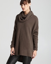 This Vince cowl neck sweater defines effortless luxury with a beautifully draped silhouette. This Vince cowl neck sweater defines effortless luxury with a beautifully draped silhouette.