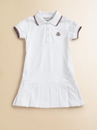 Soft, airy pique knit with sporty stripes, perfect for your future tennis star.Ribbed polo collar with two-color striped tippingShort sleeves with ribbed, tipped cuffsButton placketLogo appliqué at chestDropped waist with box pleated skirt96% cotton/4% elastaneMachine washImported Please note: Number of buttons may vary depending on size ordered. Soft, airy pique knit with sporty stripes, perfect for your future tennis star.Ribbed polo collar with two-color striped tippingShort sleeves with ribbed, tipped cuffsButton placketLogo appliqué at chestDropped waist with box pleated skirt96% cotton/4% elastaneMachine washImported Please note: Number of buttons may vary depending on size ordered.