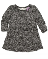 The flowing feel of this printed tunic from Osh Kosh make her style look extra sweet. The flowing feel of this printed tunic from Osh Kosh make her style look extra sweet.