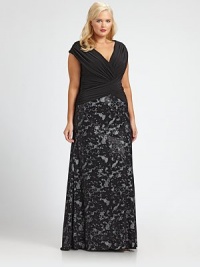 Made from soft jersey, this gown features a pleated bodice and printed skirt. You will adore the way the bodice complements your shape.V-necklineCap sleevesPleated bodiceRuched details at back zipperFully linedAbout 49 from natural waistBodice: polyester/spandexSkirt: viscose/elastaneDry cleanImported Made from soft jersey, this gown features a pleated bodice and printed skirt. You will adore the way the bodice complements your shape.V-necklineCap sleevesPleated bodiceRuched details at back zipperFully linedAbout 49 from natural waistBodice: polyester/spandexSkirt: viscose/elastaneDry cleanImported