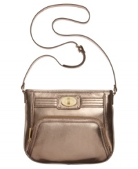 Make a move to metallic and give you're look an instant update with this compact crossbody from Calvin Klein. Soft, supple leather is finished with detail stitching and golden turnlock accent, while zipped compartments inside and out keep your essentials safe and secure. Make a move to metallic and give you're look an instant update with this compact crossbody from Calvin Klein. Soft, supple leather is finished with detail stitching and golden turnlock accent, while zipped compartments inside and out keep your essentials safe and secure.