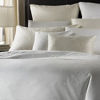 A subtle jacquard in crisp white or alabaster cotton with Supima cotton back. Imported. Sheets and cases in crisp white or alabaster 500-thread count Supima cotton sateen with embroidered cuff on flat sheets and cases. Imported. A subtle jacquard in crisp white or alabaster cotton with Supima cotton back. Imported. Sheets and cases in crisp white or alabaster 500-thread count Supima cotton sateen with embroidered cuff on flat sheets and cases. Imported.