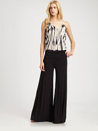 The season's most effortless one-piece in soft knit jersey styled with generous blouson top, shirred waist and wide leg.ScoopneckSpaghetti strapsElastic waistbandPull-on styleInseam, about 3492% modal/8% spandexHand washImportedModel shown is 5'10 (177cm) wearing US size Small. The season's most effortless one-piece in soft knit jersey styled with generous blouson top, shirred waist and wide leg.ScoopneckSpaghetti strapsElastic waistbandPull-on styleInseam, about 3492% modal/8% spandexHand washImportedModel shown is 5'10 (177cm) wearing US size Small.