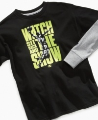 With a cool basket ball player graphic and sit back and watch the show print, this layered tee by Champion is a slam dunk. With a cool basket ball player graphic and sit back and watch the show print, this layered tee by Champion is a slam dunk.