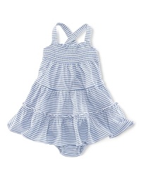 A charming smocked sundress is rendered in striped cotton jersey and finished with a ruffled hem. A charming smocked sundress is rendered in striped cotton jersey and finished with a ruffled hem.