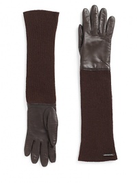 THE LOOKLeather gloves Ribbed extended cuffsMetal logo accentTHE MATERIAL60% wool/40% leatherPartially linedCARE & ORIGINDry clean by leather specialistMade in Italy THE LOOKLeather gloves Ribbed extended cuffsMetal logo accentTHE MATERIAL60% wool/40% leatherPartially linedCARE & ORIGINDry clean by leather specialistMade in Italy