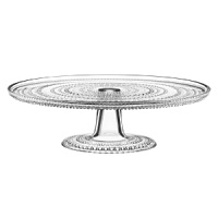 Hundreds of sparkling glass droplets traverse this dimensional piece from Iittala's Kastehelmi collection. To celebrate designer Oika Toikkas 50th, Iittala reintroduces a selection of his most popular pieces-including this pressed glass cake stand-from the original 1964 dewdrop collection. Hundreds of sparkling glass droplets traverse this dimensional piece from Iittala's Kastehelmi collection. To celebrate designer Oika Toikkas 50th, Iittala reintroduces a selection of his most popular pieces-including this pressed glass cake stand-from the original 1964 dewdrop collection.