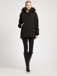 Featuring hand-warmer pockets lined in cozy fleece, everything about this quilted parka says it was designed for stylish comfort in cold temperatures. Featuring hand-warmer pockets lined in cozy fleece, everything about this quilted parka says it was designed for stylish comfort in cold temperatures.