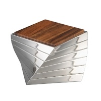 A witty design, the Twist coaster set suggests spirited style and dapper elegance while protecting tabletops from drips and water rings. With richly grained acacia wood squares set on gleaming Nambé Alloy bases, the coasters follow flowing lines that rotate subtly at the corners. When the pieces are stacked together, the rotation builds so that the whole column appears to twist upward. A strong design with appealing energy, the set makes a sophisticated addition to the living room, home bar, or study. Self-storing, the coasters number six in all and make an excellent gift celebrating an achievement or anniversary.