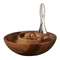 This Eclipse Nut Bowl in acacia wood, is ingeniously designed to houseboth whole nuts and their discarded shells in one gorgeous, nested vessel. The smaller bowl holdssweet almonds or salty pistachios, while the larger one waits to receive your guests' discardedshells. This Eclipse Nut Bowl in acacia wood, is ingeniously designed to houseboth whole nuts and their discarded shells in one gorgeous, nested vessel. The smaller bowl holdssweet almonds or salty pistachios, while the larger one waits to receive your guests' discardedshells.