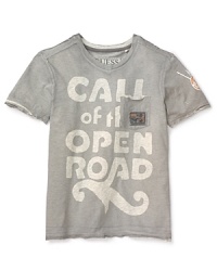 GUESS updates this tee with raw hem insets, bleached-out print across the front and a large logo patch at left sleeve. GUESS updates this tee with raw hem insets, bleached-out print across the front and a large logo patch at left sleeve.