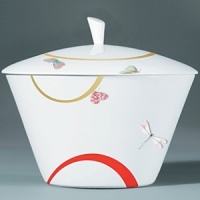 For over two centuries Raynaud has created unique Limoges porcelain, with a marked preference for relief shapes and generously colored and gilt decorations. Metamorphoses is a striking pattern of red and gold with a butterfly motif. For over two centuries Raynaud has created unique Limoges porcelain, with a marked preference for relief shapes and generously colored and gilt decorations. Metamorphoses is a striking pattern of red and gold with a butterfly motif.