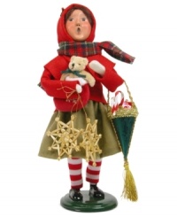 A young girl helps with the holiday shopping, picking up traditional straw ornaments, a teddy bear and treats in this handcrafted figurine from Byers' Choice. A young girl helps with the holiday shopping, picking up traditional straw ornaments, a teddy bear and treats in this handcrafted figurine from Byers' Choice.