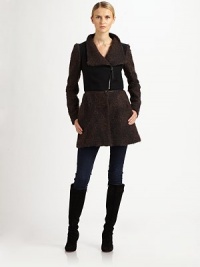Style is all about versatility. This intriguing design made from an impeccable blend of curly virgin wool, alpaca and mohair features an edgy asymmetrical zipper closure and zip-off hem. Style is all about versatility. This intriguing design made from an impeccable blend of curly virgin wool, alpaca and mohair features an edgy asymmetrical zipper closure and zip-off hem.