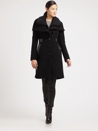 Butter-smooth leather creates a pristine look for this wool-cashmere coat with a touch of stretch. Its knit collar and intriguing seams add an impressive touch to the season.Knit detail at fold-over collarSeam detailsAsymmetrical button frontLeather welt pocketsFully linedAbout 35 from shoulder to hemWool/polyamide/cashmereDry clean by leather specialistImportedModel shown is 5'9 (175cm) wearing US size Small. Butter-smooth leather creates a pristine look for this wool-cashmere coat with a touch of stretch. Its knit collar and intriguing seams add an impressive touch to the season.Knit detail at fold-over collarSeam detailsAsymmetrical button frontLeather welt pocketsFully linedAbout 35 from shoulder to hemWool/polyamide/cashmereDry clean by leather specialistImportedModel shown is 5'9 (175cm) wearing US size Small.
