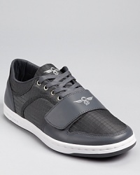 Creative Recreation adds a perforated leather upper, accented with tonal mesh panels and a strap overlay, to the classic low-top sneaker. Creative Recreation adds a perforated leather upper, accented with tonal mesh panels and a strap overlay, to the classic low-top sneaker.