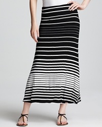 Thoroughly hypnotic, variegated black and white stripes give this Karen Kane maxi skirt a futuristic feel. Keep the style strong with a neon tank. Thoroughly hypnotic, variegated black and white stripes give this Karen Kane maxi skirt a futuristic feel. Keep the style strong with a neon tank.