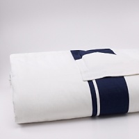 Evocative of a tranquil retreat - crisp white, deep indigo and a mélange of watercolor blues recall the place on the horizon where the sea meets the sky. Subtle woven textures of cotton and raffia complete the collection's breezy, relaxed ambiance. Evocative of a tranquil retreat - crisp white, deep indigo and a mélange of watercolor blues recall the place on the horizon where the sea meets the sky. Subtle woven textures of cotton and raffia complete the collection's breezy, relaxed ambiance.
