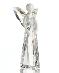 A perfect harmony of fine porcelain and exquisite crystal, the Alina angel figurine from Swarovski accents holiday homes with ethereal beauty. A perfect harmony of fine porcelain and exquisite crystal, the Alina angel figurine from Swarovski accents holiday homes with ethereal beauty.