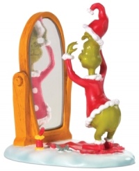 The transformation is complete! A red, fur-trimmed hat and coat are all it takes to disguise the Grinch as the bearer of gifts and good cheer. A pivotal moment in the Dr. Seuss tale, from Department 56. The transformation is complete! A red, fur-trimmed hat and coat are all it takes to disguise the Grinch as the bearer of gifts and good cheer. A pivotal moment in the Dr. Seuss tale, from Department 56.