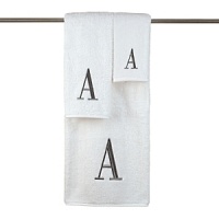 Monogram letter towels: A classic and sophisticated look, this monogrammed collection features a soft, plush oversized 100% combed cotton loop terry towel made of the finest quality materials. Choose from a white towel with a silver metallic embroidered letter of your choice in Bodoni font or an ivory towel with a brown embroidered letter of your choice in Bodoni font. All letters available A - Z. Monogram letter towels: A classic and sophisticated look, this monogrammed collection features a soft, plush oversized 100% combed cotton loop terry towel made of the finest quality materials. Choose from a white towel with a silver metallic embroidered letter of your choice in Bodoni font or an ivory towel with a brown embroidered letter of your choice in Bodoni font. All letters available A - Z.