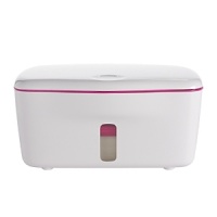 Make cleaning baby's bottom a breeze with this handy wipes dispenser, designed for efficiency and convenience with an attractive shape and pop of color.