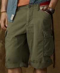 A gritty, military-inspired cargo short is lent laid-back styling with a herringbone weave and striped pocket construction for a look that is relaxed yet rugged. A gritty, military-inspired cargo short is lent laid-back styling with a herringbone weave and striped pocket construction for a look that is relaxed yet rugged.