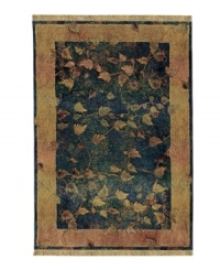 Marked by intriguing visual texture and saturated color, this rug features a pattern of burnished gold leaves that seem to break through a gauzy emerald background. A floating gold border perfectly frames the rug's dynamic beauty. Weathered details impart a timeworn, vintage look. Marked by intriguing visual texture and saturated color, this rug features a pattern of burnished gold leaves that seem to break through a gauzy emerald background. A floating gold border perfectly frames the rug's dynamic beauty. Weathered details impart a timeworn, vintage look.