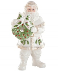 Santa's got it all. Radiating grace in glazed porcelain, this collectible figurine carries a simple wreath and, adorned with a quaint holly pattern, coordinates beautifully with classic Holiday decor by Lenox. Santa's got it all. Radiating grace in glazed porcelain, this collectible figurine carries a simple wreath and, adorned with a quaint holly pattern, coordinates beautifully with classic Holiday decor by Lenox.