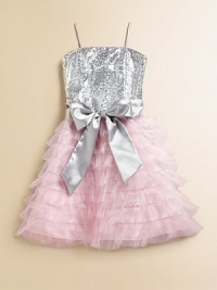 This spectacular frock is bejeweled with a sequined bodice, sash tie and full ruffled skirt for a stunning ensemble.Straight necklineSleeveless with spaghetti strapsBack zipperWaistband with sash tieFull skirt with tiered rufflesPolyesterDry cleanMade in the USA of imported fabric This spectacular frock is bejeweled with a sequined bodice, sash tie and full ruffled skirt for a stunning ensemble.Straight necklineSleeveless with spaghetti strapsBack zipperWaistband with sash tieFull skirt with tiered rufflesPolyesterDry cleanMade in the USA of imported fabric