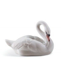 The epitome of elegance, the Lladro swan figurine captures all the serenity and grace of nature's ugly duckling in glazed porcelain. The epitome of elegance, the Lladro swan figurine captures all the serenity and grace of nature's ugly duckling in glazed porcelain.