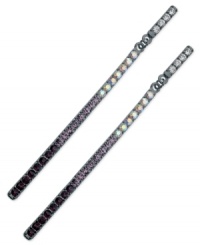Elongate your elegance with these drop earrings from GUESS. The lengthy silhouette features light amethyst, clear crystal and AB crystal accents. Crafted in hematite tone mixed metal. Approximate drop: 3-1/2 inches. Elongate your elegance with these drop earrings from GUESS. The lengthy silhouette features light amethyst, clear crystal and AB crystal accents. Crafted in hematite tone mixed metal. Approximate drop: 3-1/2 inches.