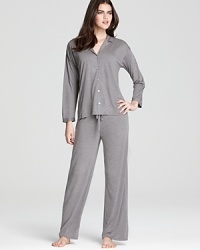 Pajama perfection, this transitional Natori set features a long-sleeve top and lightweight knit pants. Pajama perfection, this transitional Natori set features a long-sleeve top and lightweight knit pants.