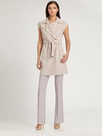This wonderfully soft trench-inspired style features goldtone buttons and a matching sash belt.Notched lapelsCap sleevesDouble-breasted button frontSelf beltAbout 35 from shoulder to hem60% wool/30% angora/10% cashgoraDry cleanMade in ItalyModel shown is 5'11 (180cm) wearing US size 4. This wonderfully soft trench-inspired style features goldtone buttons and a matching sash belt.Notched lapelsCap sleevesDouble-breasted button frontSelf beltAbout 35 from shoulder to hem60% wool/30% angora/10% cashgoraDry cleanMade in ItalyModel shown is 5'11 (180cm) wearing US size 4.
